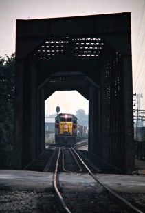 Westbound Erie Lackawanna Railway freight train in Sharon, Pennsylvania, on July 19, 1975. Photograph by John F. Bjorklund, © 2016, Center for Railroad Photography and Art. Bjorklund-54-30-10