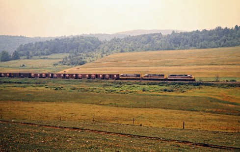 Westbound Erie Lackawanna Railway freight train in Friendship, New York, on July 20, 1975. Photograph by John F. Bjorklund, © 2016, Center for Railroad Photography and Art. Bjorklund-55-03-20