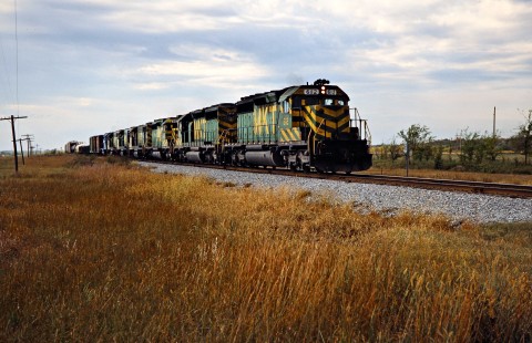 Northbound Missouri–Kansas–Texas Railroad freight train in Mazie, Oklahoma, on October 18, 1988. Photograph by John F. Bjorklund, © 2016, Center for Railroad Photography and Art. Bjorklund-70-21-04