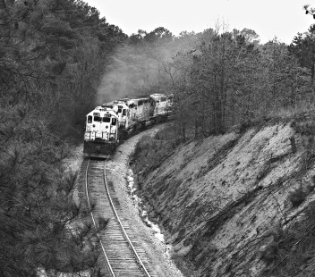 Southbound Kansas City Southern Railway coal train fights through rugged country near Cove, Arkansas, in April 1985. Photograph by J. Parker Lamb, © 2016, Center for Railroad Photography and Art. Lamb-02-073-05
