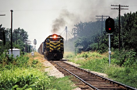 Eastbound Missouri–Kansas–Texas Railroad freight train at Atchison, Topeka and Santa Fe Railway crossing in Walnut, Kansas, on July 14, 1981. Photograph by John F. Bjorklund, © 2016, Center for Railroad Photography and Art. Bjorklund-70-08-11