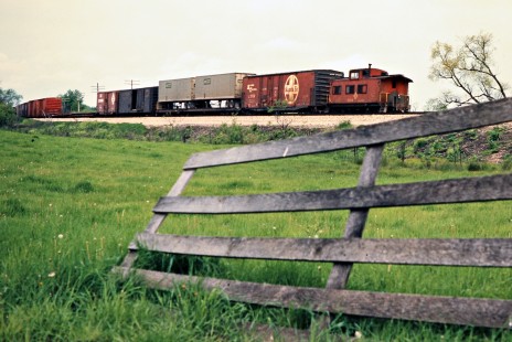 Caboose of westbound Erie Lackawanna Railway freight train at Pavonia, Ohio, on May 13, 1972. Photograph by John F. Bjorklund, © 2016, Center for Railroad Photography and Art. Bjorklund-54-10-01