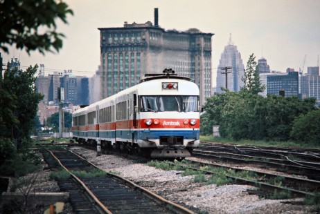 Eastbound Amtrak passenger train no. 350 operating on Penn Central in Detroit, Michigan, on June 1, 1975. Photograph by John F. Bjorklund, © 2016, Center for Railroad Photography and Art. Bjorklund-79-29-02