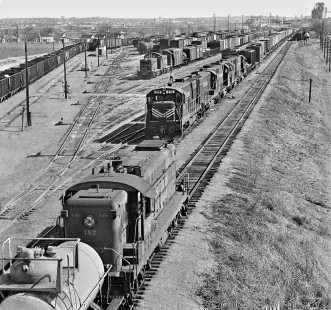Southern Pacific Railroad transfer heads south past Rock Island Line's Peach Yard in Fort Worth, Texas, in August 1969. Photograph by J. Parker Lamb, © 2016, Center for Railroad Photography and Art. Lamb-02-073-12