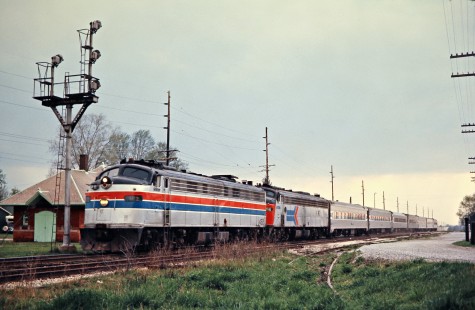 Amtrak passenger train no. 364, the <i>Blue Water Limited</i>, operating Conrail track in Three Oaks, Michigan, on April 18, 1976. Photograph by John F. Bjorklund, © 2016, Center for Railroad Photography and Art. Bjorklund-80-04-09