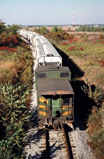 Caboose of a westbound Missouri–Kansas–Texas Railroad freight train near Porter, Oklahoma, on October 16, 1988. Photograph by John F. Bjorklund, © 2016, Center for Railroad Photography and Art. Bjorklund-70-19-02