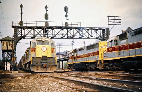 Westbound and eastbound Erie Lackawanna Railway trains meet in Marion, Ohio, on May 12, 1973. Photograph by John F. Bjorklund, © 2016, Center for Railroad Photography and Art. Bjorklund-54-10-09