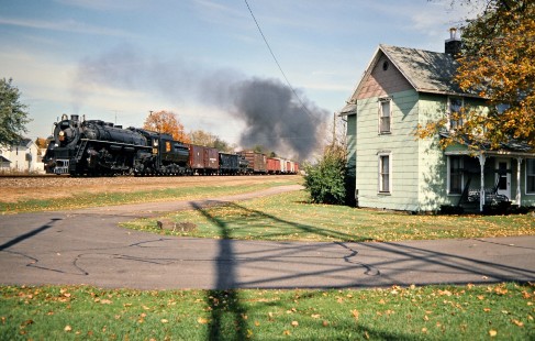 Westbound Ohio Central Railroad freight train with former Grand Trunk Western steam locomotive no. 6325 at Conesville, Ohio, on October 20, 2003. Photograph by John F. Bjorklund, © 2016, Center for Railroad Photography and Art. Bjorklund-78-21-08