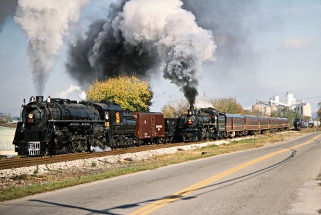 Westbound Ohio Central Railroad freight and passenger train with former Grand Trunk Western locomotive no. 6325 and former Canadian Pacific Railway locomotive no. 1293 at Coshocton, Ohio, on October 19, 2003. Photograph by John F. Bjorklund, © 2016, Center for Railroad Photography and Art. Bjorklund-78-17-15