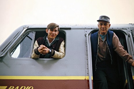 Erie Lackawanna Railway crew members in locomotive cab (front brakeman in window and engineer in doorway) at Huntington, Indiana, on October 22, 1972. Photograph by John F. Bjorklund, © 2016, Center for Railroad Photography and Art. Bjorklund-54-08-12