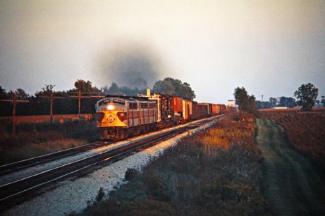 Westbound Erie Lackawanna Railway freight train in Converse, Ohio, on September 28, 1975. Photograph by John F. Bjorklund, © 2016, Center for Railroad Photography and Art. Bjorklund-55-12-19
