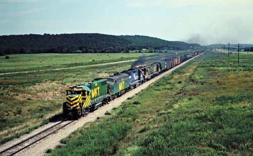 Southbound Missouri–Kansas–Texas Railroad freight train in Crowder, Oklahoma, on July 16, 1981. Photograph by John F. Bjorklund, © 2016, Center for Railroad Photography and Art. Bjorklund-70-14-10
