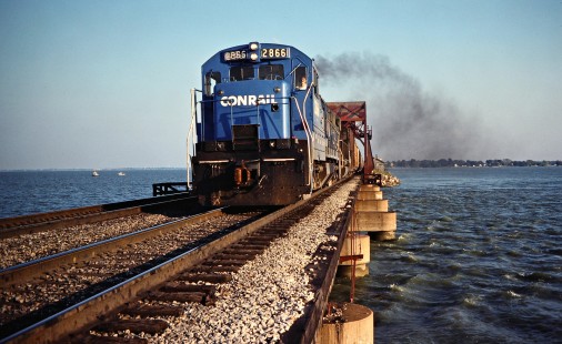 Westbound Conrail freight train crossing Bay Bridge in Danbury, Ohio, on September 3, 1978. Photograph by John F. Bjorklund, © 2016, Center for Railroad Photography and Art. Bjorklund-81-08-19