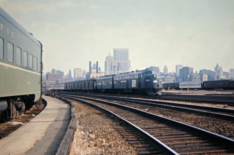 Penn Central passenger train no. 64 in Chicago, Illinois, on April 11, 1971. Photograph by John F. Bjorklund, © 2016, Center for Railroad Photography and Art. Bjorklund-79-05-15