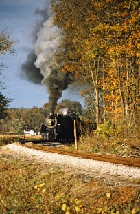 Southbound Ohio Central Railroad freight train with former Grand Trunk Western steam locomotive no. 6325 at Baltic, Ohio, on October 18, 2003. Photograph by John F. Bjorklund, © 2016, Center for Railroad Photography and Art. Bjorklund-78-14-05