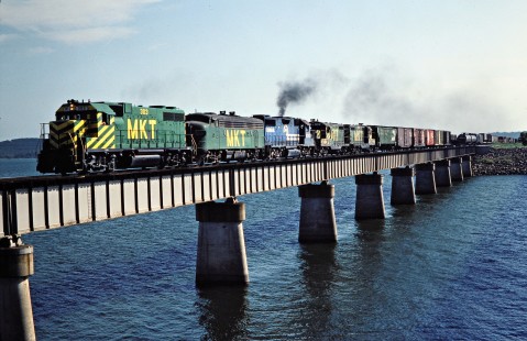 Southbound Missouri–Kansas–Texas Railroad freight train crossing the Eufaula Reservoir in Canadian, Oklahoma, on July 16, 1981. Photograph by John F. Bjorklund, © 2016, Center for Railroad Photography and Art. Bjorklund-70-13-04