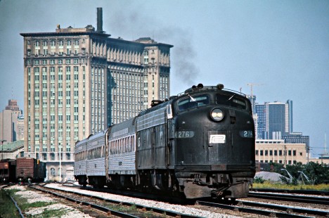 Westbound Amtrak passenger train no. 373, the <i>Michigan Executive</i>, operating on Conrail (recent merger with Penn Central) in Detroit, Michigan, on June 3, 1976. Photograph by John F. Bjorklund, © 2016, Center for Railroad Photography and Art. Bjorklund-80-07-01