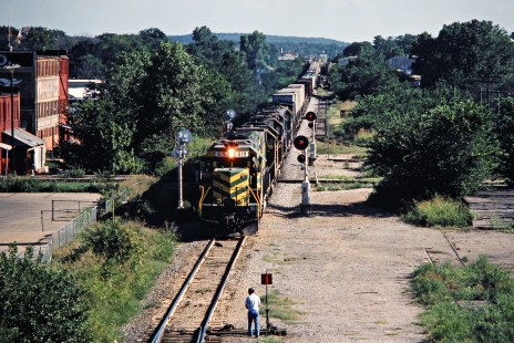 Northbound Missouri–Kansas–Texas Railroad freight train at Chicago, Rock Island and Pacific Railroad crossing in McAlester, Oklahoma, on July 15, 1981. Photograph by John F. Bjorklund, © 2016, Center for Railroad Photography and Art. Bjorklund-70-11-03