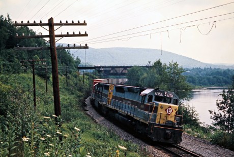 Westbound Erie Lackawanna Railway freight train in Hancock, New York, on July 22, 1975. Photograph by John F. Bjorklund, © 2016, Center for Railroad Photography and Art. Bjorklund-55-07-02