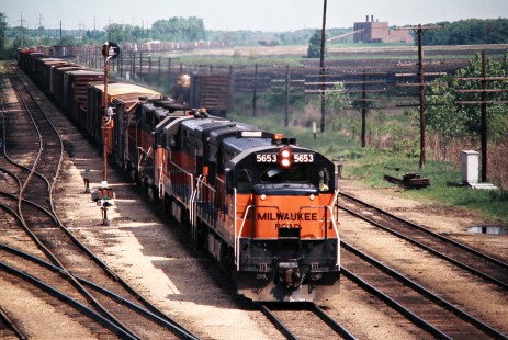 Eastbound Milwaukee Road freight train in Rondout, Illinois, on May 26, 1975. Photograph by John F. Bjorklund, © 2016, Center for Railroad Photography and Art. Bjorklund-64-24-13