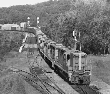 Five Geeps with an eastbound Boston and Maine freight train arrive at yard in East Deerfield, Massachusetts, in early morning in June 1980. Photograph by J. Parker Lamb, © 2017, Center for Railroad Photography and Art. Lamb-02-115-02