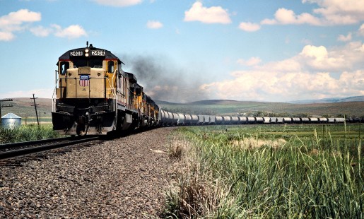 Eastbound Union Pacific Railroad freight train in North Powder, Oregon, on June 26, 1988. Photograph by John F. Bjorklund, © 2016, Center for Railroad Photography and Art. Bjorklund-91-08-13