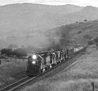 Westbound Southern Pacific Railroad manifest struggles toward Paisano Summit near dusk in October 1984. Photograph by J. Parker Lamb, © 2017, Center for Railroad Photography and Art. Lamb-02-085-07