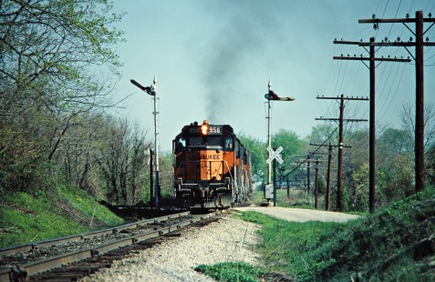 Eastbound Milwaukee Road freight train in Mitchell, Indiana, on April 28, 1978. Photograph by John F. Bjorklund, © 2016, Center for Railroad Photography and Art. Bjorklund-66-02-09