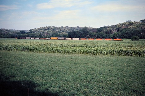 Eastbound Milwaukee Road freight train in Harmony, Minnesota, on July 19, 1976. Photograph by John F. Bjorklund, © 2016, Center for Railroad Photography and Art. Bjorklund-65-06-10