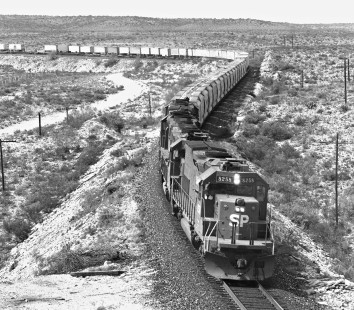Eastbound Southern Pacific Railroad Trailer On Flat Car freight train departs Shumla siding (west of Del Rio, Texas) in October 1984. Photograph by J. Parker Lamb, © 2017, Center for Railroad Photography and Art. Lamb-02-081-08