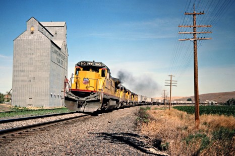 Eastbound Union Pacific Railroad freight train in Nolin, Oregon, on June 30, 1988. Photograph by John F. Bjorklund, © 2016, Center for Railroad Photography and Art. Bjorklund-91-15-04