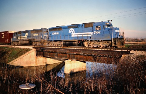 Northbound Conrail freight train in LaSalle, Michigan, on May 5, 1979. Photograph by John F. Bjorklund, © 2016, Center for Railroad Photography and Art. Bjorklund-81-15-16