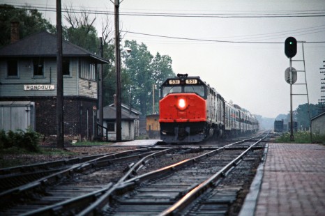 Westbound Amtrak passenger train no. 7, the <i>Empire Builder</i>, at Rondout, Illlinois, on July 6, 1975. Photograph by John F. Bjorklund, © 2016, Center for Railroad Photography and Art. Bjorklund-64-27-16