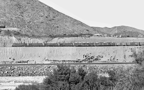 Los Angeles-bound Southern Pacific Railroad freight train approaches Colton yard via recently completed Palmdale Cutoff near San Bernardino, California, in September 1968. Photograph by J. Parker Lamb, © 2017, Center for Railroad Photography and Art. Lamb-02-094-02