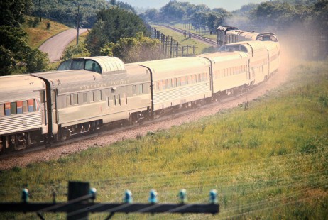 Westbound Amtrak passenger train no. 7, the <i>Empire Builder</i>, on the Milwaukee Road at Tunnel City, Wisconsin, on July 4, 1975. Photograph by John F. Bjorklund, © 2016, Center for Railroad Photography and Art. Bjorklund-64-25-10
