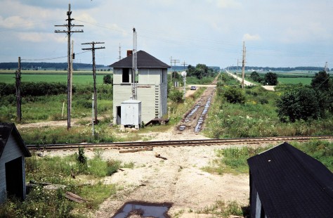 Old Milwaukee Road crossing at Delmar, Illinois, in August 1981. Photograph by John F. Bjorklund, © 2016, Center for Railroad Photography and Art. Bjorklund-69-05-03