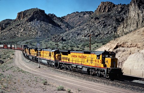 Eastbound Union Pacific Railroad freight train at Islen, Nevada, on April 9, 1989. Photograph by John F. Bjorklund, © 2016, Center for Railroad Photography and Art. Bjorklund-91-25-22