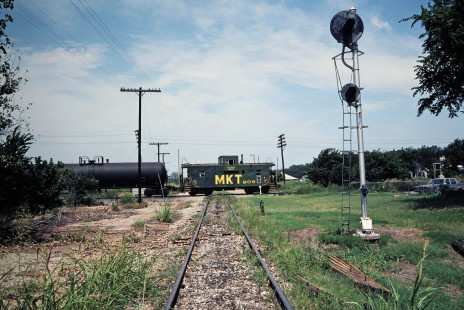 Southbound Missouri–Kansas–Texas Railroad freight train at Chicago, Rock Island and Pacific Railroad crossing in McAlester, Oklahoma, on July 16, 1981. Photograph by John F. Bjorklund, © 2016, Center for Railroad Photography and Art. Bjorklund-70-15-16