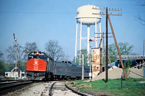 Eastbound Amtrak passenger train no. 52, the <i>Floridian</i>, on Milwaukee Road track in Orleans, Indiana, on April 28, 1978. Photograph by John F. Bjorklund, © 2016, Center for Railroad Photography and Art. Bjorklund-66-02-13