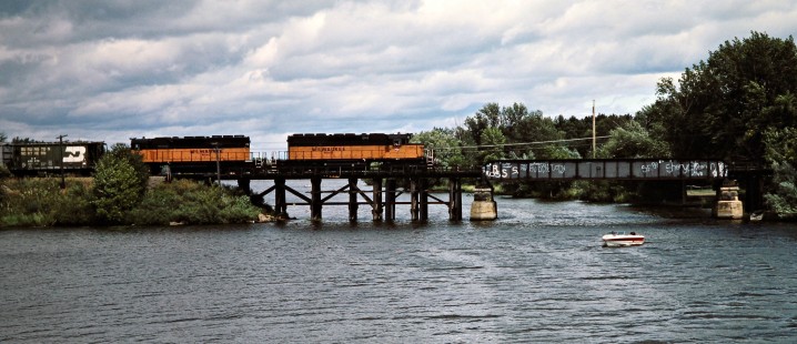 Southbound Milwaukee Road freight train on Burlington Northern track at Pine City, Minnesota, on August 8, 1982. Photograph by John F. Bjorklund, © 2016, Center for Railroad Photography and Art. Bjorklund-69-07-09