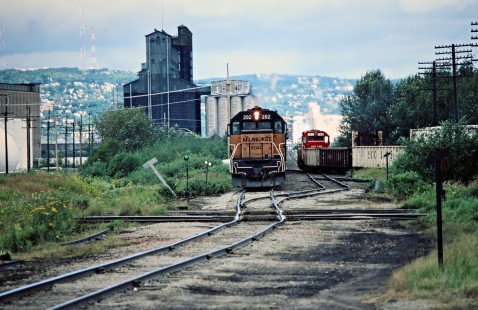 Southbound Milwaukee Road freight train at Burlington Northern and Soo Line crossing in Superior, Wisconsin, on August 8, 1982. Photograph by John F. Bjorklund, © 2016, Center for Railroad Photography and Art. Bjorklund-69-06-05