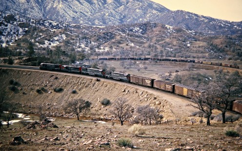 Southern Pacific Railroad freight train on the loop at Tehachapi, California, on December 16, 1972. Photograph by John F. Bjorklund, © 2016, Center for Railroad Photography and Art. Bjorklund-84-06-15