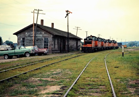 Eastbound Milwaukee Road switchers at Spring Valley, Minnesota, on July 19, 1976. Photograph by John F. Bjorklund, © 2016, Center for Railroad Photography and Art. Bjorklund-65-04-03
