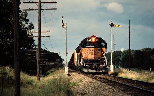 Southbound Milwaukee Road freight train on Burlington Northern track in North Branch, Minnesota, on August 8, 1982. Photograph by John F. Bjorklund, © 2016, Center for Railroad Photography and Art. Bjorklund-69-07-07