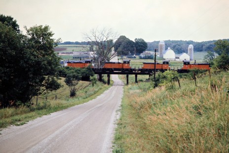 Westbound Milwaukee Road freight train in Prosper, Minnesota, on July 20, 1976. Photograph by John F. Bjorklund, © 2016, Center for Railroad Photography and Art. Bjorklund-65-08-05