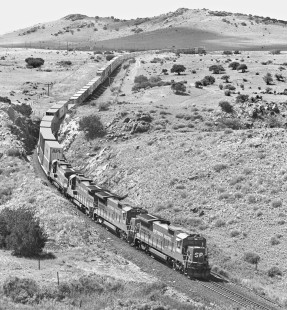 GE B-39 locomotives lead a Southern Pacific Railroad stack train downgrade from Paisano Summit in Alpine, Texas, in September 1987. Photograph by J. Parker Lamb, © 2017, Center for Railroad Photography and Art. Lamb-02-086-03