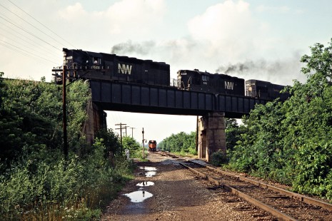Southbound Milwaukee Road freight train meets westbound Norfolk and Western Railway train at Danville, Illinois, on July 2, 1978. Photograph by John F. Bjorklund, © 2016, Center for Railroad Photography and Art. Bjorklund-66-26-15
