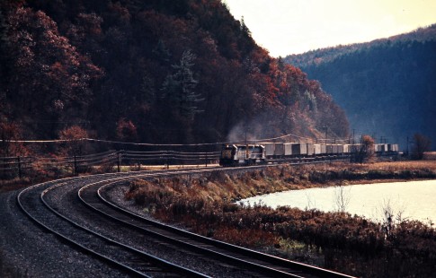 Westbound Erie Lackawanna Railway freight train in Cameron, New York, on October 20, 1974. Photograph by John F. Bjorklund, © 2016, Center for Railroad Photography and Art. Bjorklund-54-27-11