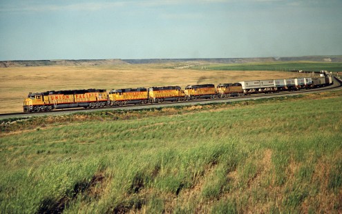 Westbound Union Pacific Railroad freight train at Reverse, Idaho, on June 29, 1984. Photograph by John F. Bjorklund, © 2016, Center for Railroad Photography and Art. Bjorklund-90-13-24