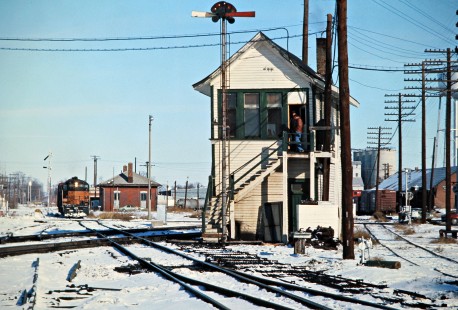 Southbound Milwaukee Road freight train at Burlington Northern crossing in Mendota, Illinois, on January 22, 1977. Photograph by John F. Bjorklund, © 2016, Center for Railroad Photography and Art. Bjorklund-65-12-11
